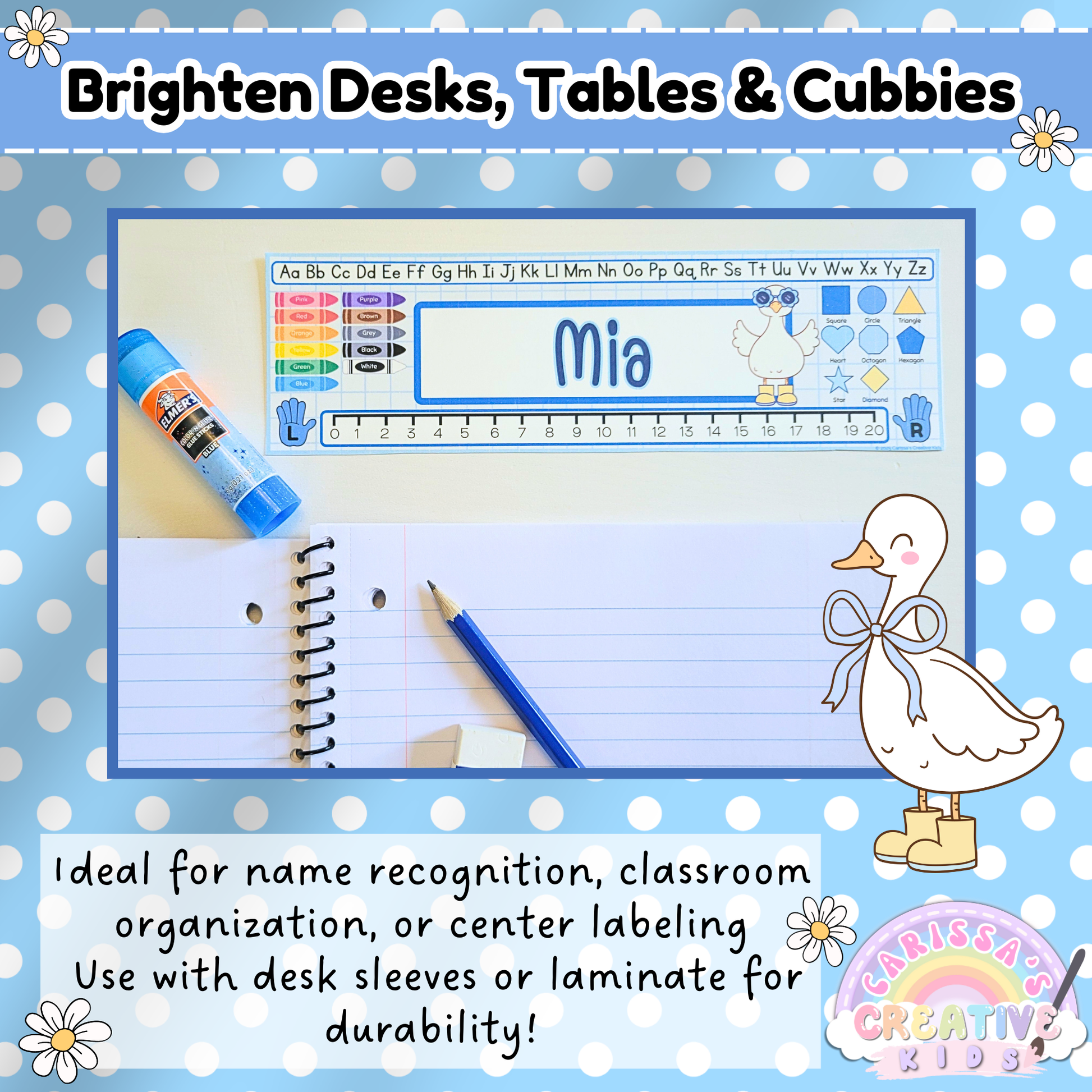 Silly Goose desk name plate labeled "Mia" displayed on a student desk with notebook and glue stick. Editable classroom name tag features alphabet, number line, and color chart. Ideal for preschool or kindergarten desk decor and name recognition.
